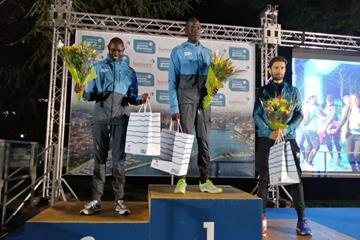 Refugee Athletes Domnic Lokinyomo Lobalu (c) and Paulo Amotun Lokoro (l) after their 1-2 finish in the Geneva 10km (Bernard Rono)