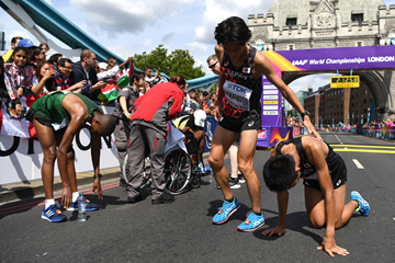 Exhausted athletes at the end of the marathon (Getty Images)