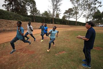 IAAF President Sebastian Coe watches as athletes train at the refugee camp in Ngong (Getty Images)