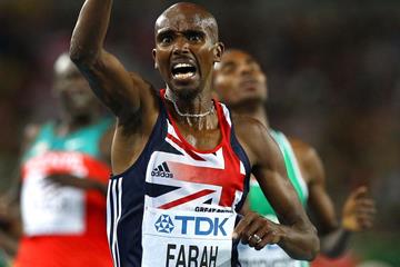  Mohamed Farah of Great Britain celebrates as he crosses the finish line to claim victory in the men's 5000 metres final  (Getty Images)