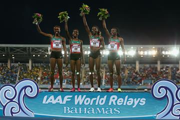 L-R) Mercy Cherono, Faith Chepngetich Kipyegon, Irene Jelagat and Hellen Onsando Obiri of Kenya celebrate on the podium after setting a new world record of 16:33.58 and winning the Women's 4x1500 metres relay  (Getty Images)