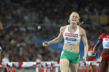 Sally Pearson of Australia crosses the line in the women's 100 metres hurdles final (Getty Images)