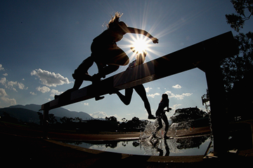 Athletes in action in the steeplechase (Getty Images)