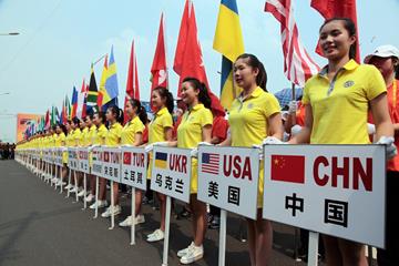 Volunteers with the name of participating countries at the opening ceremony of IAAF World Race Walking Cup Taicang 2014 (Kevin Lee)