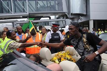 Usain Bolt returns to heroes welcome in Kingston airport (Paul Reid)