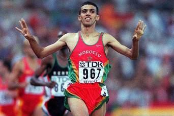 Hicham El Guerrouj winning the 1500m at the 1999 IAAF World Championships (Allsport)