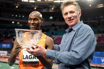 Bernard Lagat after taking his 8th Wanamaker Mile title at the 2010 Millrose Games; with seven-time winner Eamonn Coghlan, (Kirby Lee)