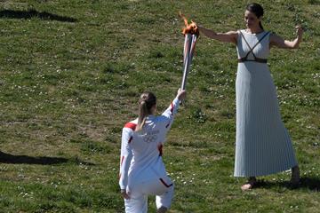 Anna Korakaki, Rio 2016 shooting gold medallist, receives the Olympic flame during the flame lighting ceremony in ancient Olympia (AFP/Getty Images)