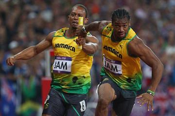 Yohan Blake of Jamaica receives the relay baton from Michael Frater of Jamaica during the Men's 4 x 100m Relay of the London 2012 Olympic Games on 11 August 2012 (Getty Images)