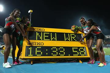 (L-R) Irene Jelagat, Faith Chepngetich Kipyegon, Mercy Cherono and Hellen Onsando Obiri of Kenya pose together after setting a new world record of 16:33.58 in the Women's 4x1500 metres relay (Getty Images)