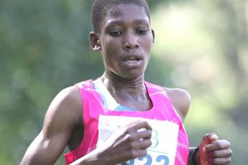 Alice Aprot on her way to winning the 6km junior women's race at the KCB Cross Country Athletics series at Kisii (Mohammed Amin)