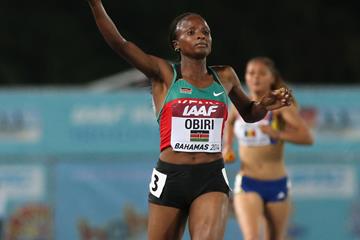 Hellen Onsando Obiri of Kenya celebrates as she crosses the finish line to win and set a new world record of 16:33.58 in the Women's 4x1500 metres relay (Getty Images)