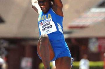Rhonda Watkins (TRI) long jumping at the PAC-10 (Kirby Lee)