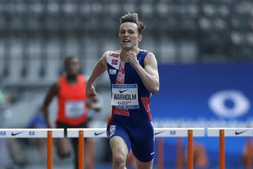 Karsten Warholm en route to the ISTAF meeting record (AFP/Getty Images)