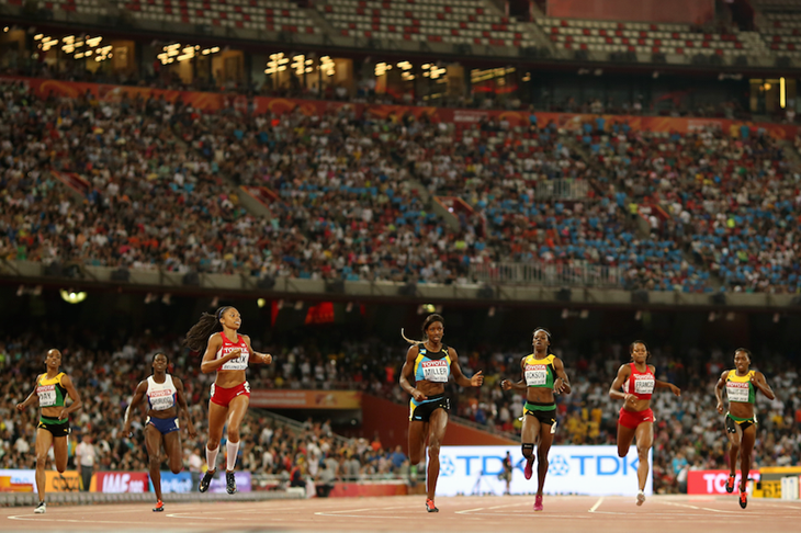 Athletes crossing the finish line in the women's 400m at the Beijing World Champs ()