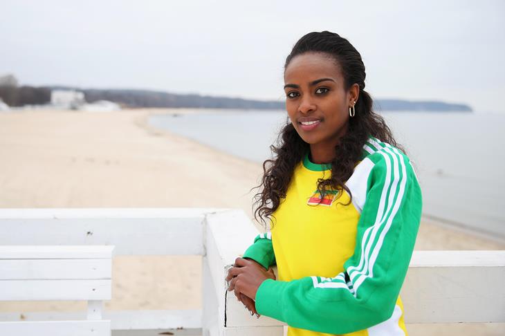 Genzebe Dibaba on the pier with beach in background ahead of Sopot 2014 ()